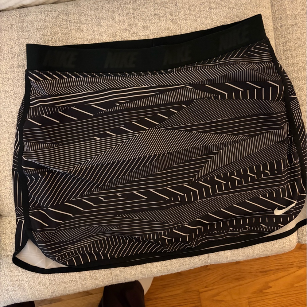 Two Nike Women golf skirts